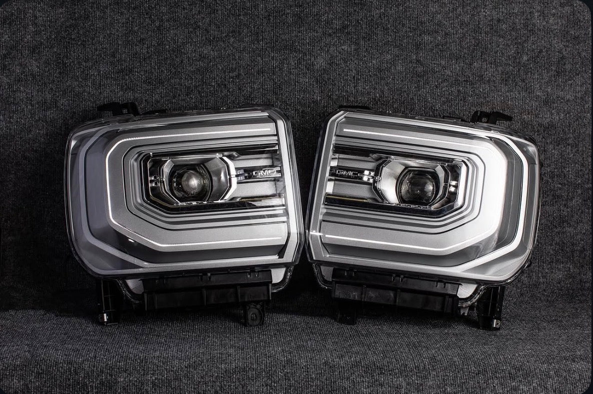 GMC Sierra C-Bar OEM Projector Headlights (2016-2019 HD / 1500)