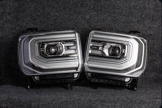 GMC Sierra C-Bar OEM Projector Headlights (2016-2019 HD / 1500)